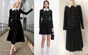 Bespoke black pleated skirt suit with white contrast collar and gold buttons - custom made by our studio