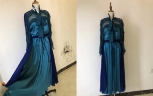 Bespoke teal satin gown with navy sheer chiffon overlay and statement bow - custom made by our studio